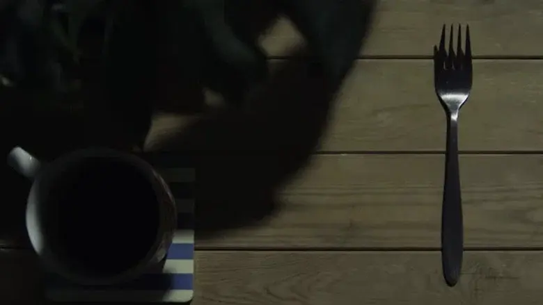 The Man with the Fork still 1