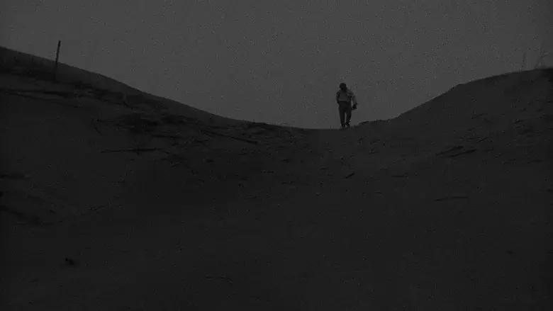 Woman in the Dunes still 8